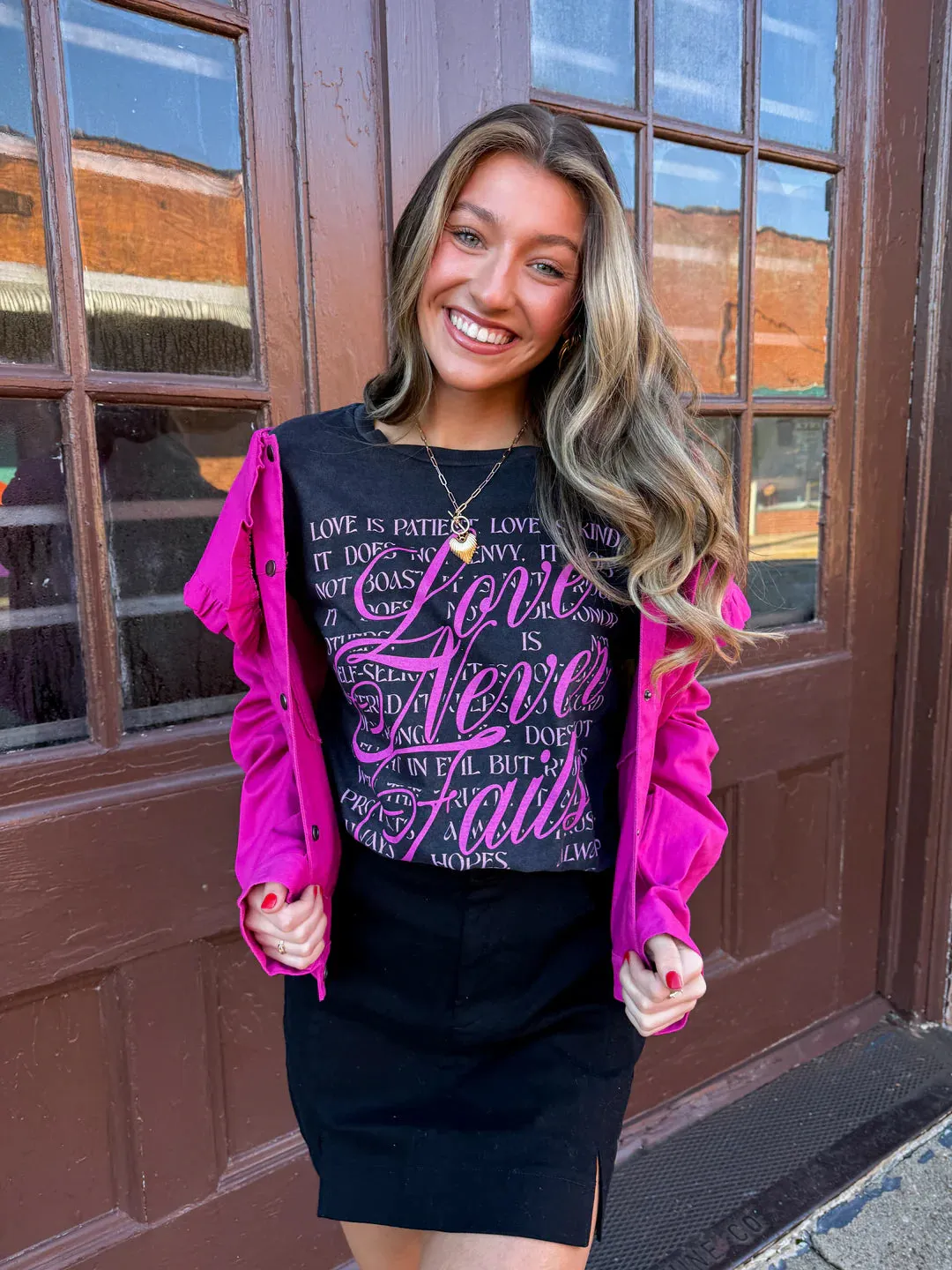 Love never fails tee